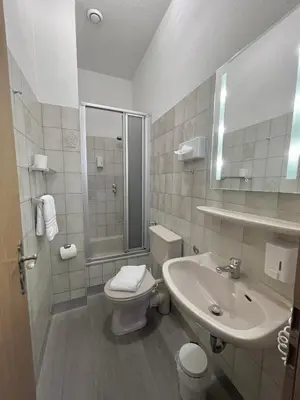 Ein Badezimmer in der Unterkunft Parkhotel Essen