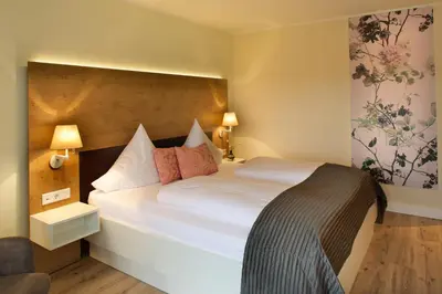 Ein Bett oder Betten in einem Zimmer der Unterkunft Jammertal Resort