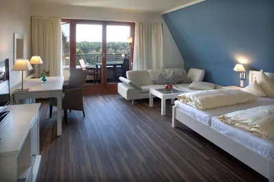 Ein Bett oder Betten in einem Zimmer der Unterkunft Jammertal Resort