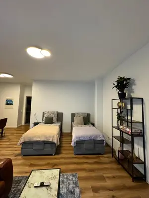 Ein Bett oder Betten in einem Zimmer der Unterkunft Zeitperlewohnen Green