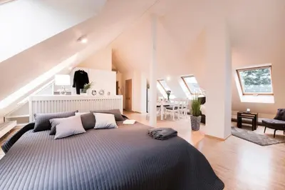 Ein Bett oder Betten in einem Zimmer der Unterkunft Parkside Apartment House