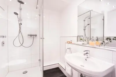 Ein Badezimmer in der Unterkunft Parkside Apartment House