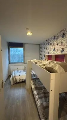 Ein Bett oder Betten in einem Zimmer der Unterkunft Charmante 3 Zimmer Wohnung mit Balkon ideal für Familien in Dortmund Scharnhorst