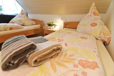 Ein Bett oder Betten in einem Zimmer der Unterkunft Top Apartmentwohnungen Veltins Arena