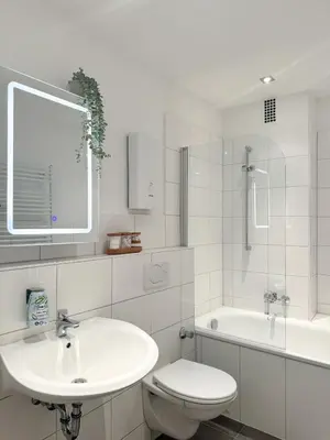 Ein Badezimmer in der Unterkunft Moderne City-Wohnung mit Self Check-In und Free Wifi im Zentrum