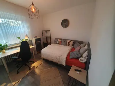 Ein Bett oder Betten in einem Zimmer der Unterkunft Apartment Duisburg North