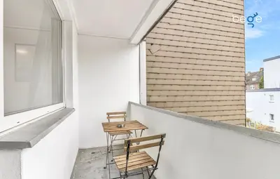 Ein Balkon oder eine Terrasse in der Unterkunft BEGE APARTMENTS Work Comfort