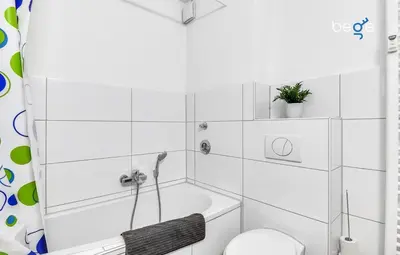 Ein Badezimmer in der Unterkunft BEGE APARTMENTS Work Comfort