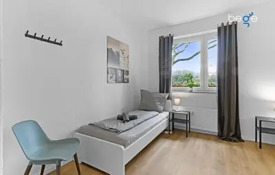 Ein Bett oder Betten in einem Zimmer der Unterkunft BEGE APARTMENTS Business Oasis