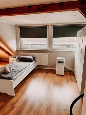 Ein Bett oder Betten in einem Zimmer der Unterkunft Zentral in Essen! 5 Gehminuten vom Bahnhof ! WHDG