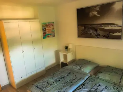 Ein Bett oder Betten in einem Zimmer der Unterkunft Über den Dächern Gelsenkirchens - Nähe Arena