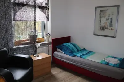 Ein Bett oder Betten in einem Zimmer der Unterkunft Pension Gladbeck - Ihre Pension im Ruhrgebiet