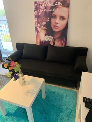 Ein Sitzbereich in der Unterkunft studio 59 , Boxspringbett, TV, Balkon, Loggia, Küche, Bad, W-lan