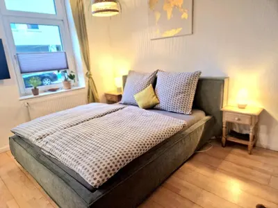 Ein Bett oder Betten in einem Zimmer der Unterkunft Gemütliches Studio nahe Stadion, Westfalenhalle & Innenstadt