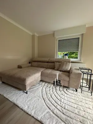 Ein Sitzbereich in der Unterkunft Moderne Ferienwohnung voll möbliert und zentral