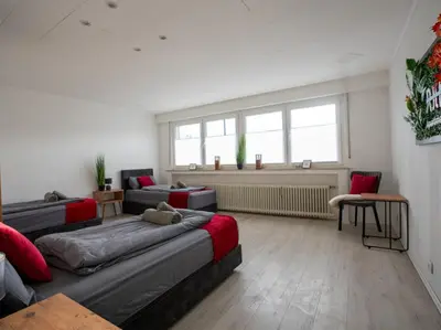Ein Sitzbereich in der Unterkunft Serviceroom24 - Apartment 2 in Gladbeck WLAN - Smart-TV - 24-7 Check-in und Küche