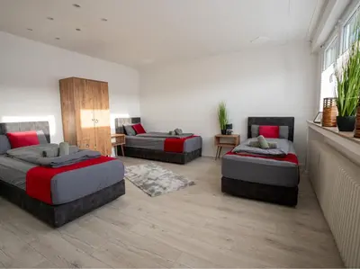 Ein Bett oder Betten in einem Zimmer der Unterkunft Serviceroom24 - Apartment 2 in Gladbeck WLAN - Smart-TV - 24-7 Check-in und Küche