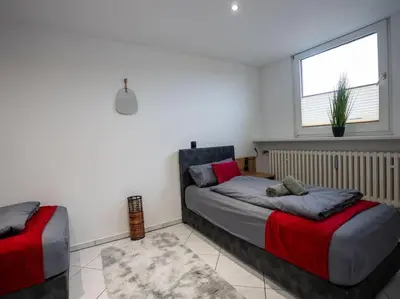 Ein Bett oder Betten in einem Zimmer der Unterkunft Serviceroom24 - Apartment 4 in Gladbeck WLAN - Smart-TV - 24-7 Check-in und Küche