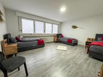 Ein Sitzbereich in der Unterkunft Serviceroom24 - Space in Gladbeck WLAN - Smart-TV - 24-7 Check-in und Küche
