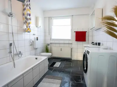 Ein Badezimmer in der Unterkunft Serviceroom24 - Space in Gladbeck WLAN - Smart-TV - 24-7 Check-in und Küche