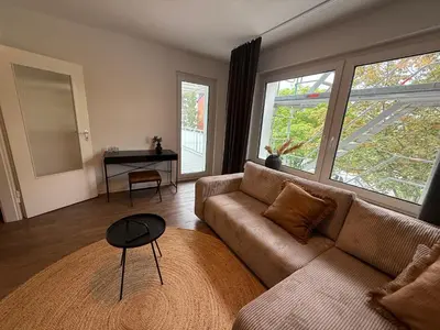 Ein Sitzbereich in der Unterkunft Messe Essen, Modernes Apartment mit Küche, Balkon & Self-Check-in