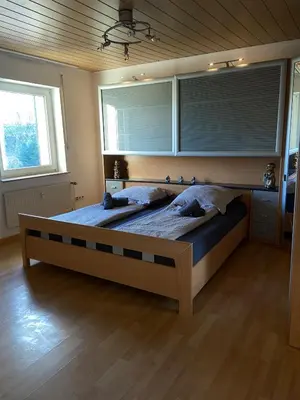 Ein Bett oder Betten in einem Zimmer der Unterkunft Wohnglück 5