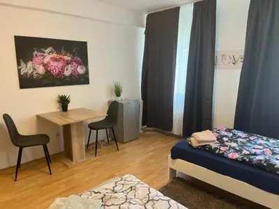 Ein Bett oder Betten in einem Zimmer der Unterkunft Monteurwohnung Nähe MoviePark