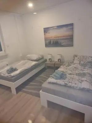 Ein Bett oder Betten in einem Zimmer der Unterkunft Monteurwohnung in Marl - Lipper 70 - EG