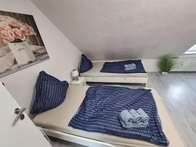 Ein Bett oder Betten in einem Zimmer der Unterkunft Monteurunterkunft Nähe CentrO Oberhausen - DGL