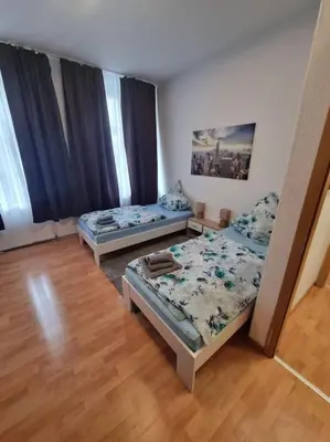 Ein Bett oder Betten in einem Zimmer der Unterkunft Monteurunterkunft Nähe CentrO Oberhausen - 1OGL