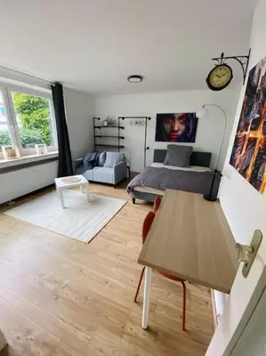 Ein Sitzbereich in der Unterkunft Moderne Wohnung in Toplage
