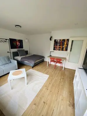 Ein Bett oder Betten in einem Zimmer der Unterkunft Moderne Wohnung in Toplage