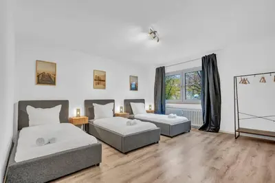Ein Bett oder Betten in einem Zimmer der Unterkunft Schöne Essen Wohnung - 5 Betten
