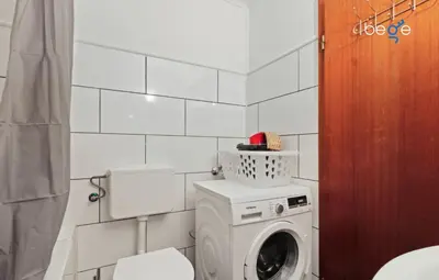 Ein Badezimmer in der Unterkunft BEGE APARTMENTS WorkLounge
