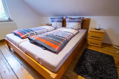 Ein Bett oder Betten in einem Zimmer der Unterkunft familienfreundliche Ferienwohnung nahe WestfieldCentrO