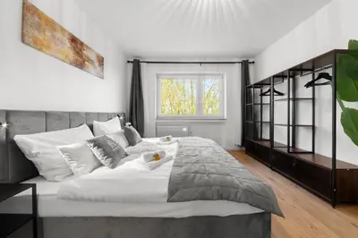 Ein Bett oder Betten in einem Zimmer der Unterkunft VlNFUL2 Premium-Apartment mit Balkon und Parkplatz