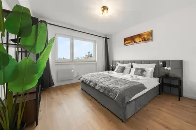 Ein Bett oder Betten in einem Zimmer der Unterkunft VlNFUL2 Premium-Apartment mit Balkon und Parkplatz
