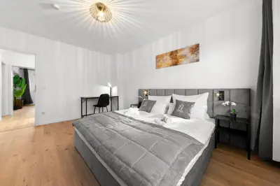 Ein Bett oder Betten in einem Zimmer der Unterkunft VlNFUL2 Premium-Apartment mit Balkon und Parkplatz