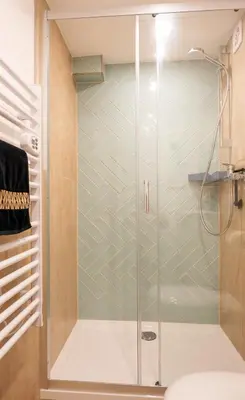Ein Badezimmer in der Unterkunft Moderner Appartment Zentrumnah