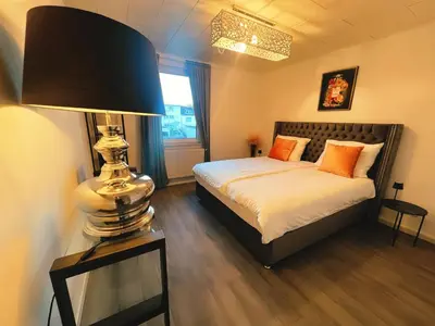 Ein Bett oder Betten in einem Zimmer der Unterkunft Wohngut City Appartement 4 für 1-4 Personen inklusive Parkplatz