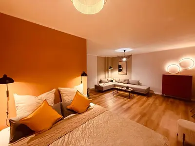 Ein Bett oder Betten in einem Zimmer der Unterkunft Modernes Design-Apartment in Hünxe