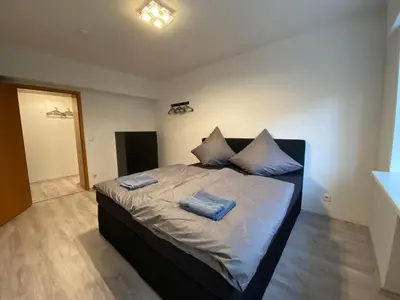 Ein Bett oder Betten in einem Zimmer der Unterkunft Moderne Wohnung - nahe Dortmund!