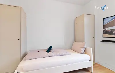 Ein Bett oder Betten in einem Zimmer der Unterkunft BEGE APARTMENTS Work Life Lodge