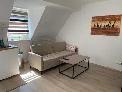 Ein Sitzbereich in der Unterkunft POLAT Apartments 6