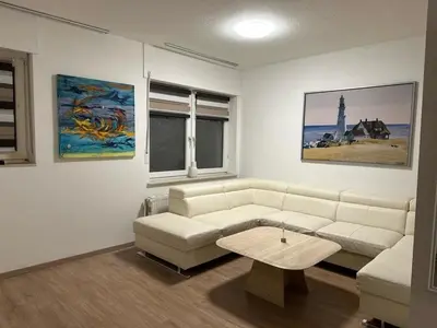 Ein Sitzbereich in der Unterkunft POLAT Apartments 8