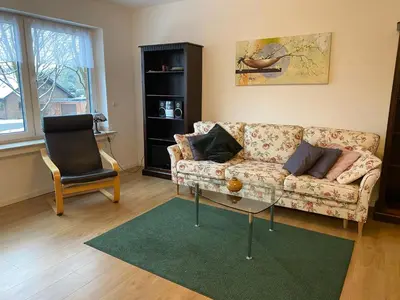 Ein Sitzbereich in der Unterkunft 3 Schlafzimmer und überdachtem Südbalkon in Haltern