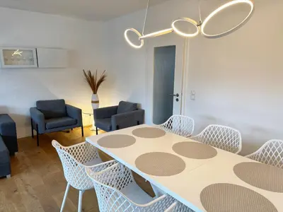 Ein Sitzbereich in der Unterkunft 3 Zimmer Wohnung mit Garten