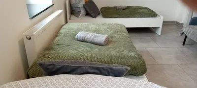 Ein Bett oder Betten in einem Zimmer der Unterkunft TOPFLAT mit Küche I gratis Parkplatz I zwei Schlafzimmer I zentrumnah