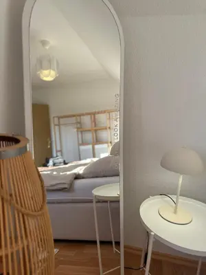 Ein Bett oder Betten in einem Zimmer der Unterkunft Weitblick Neviges