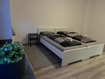 Ein Bett oder Betten in einem Zimmer der Unterkunft areahome